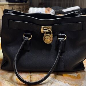 Michael Kors Black Satchel with Gold Accents